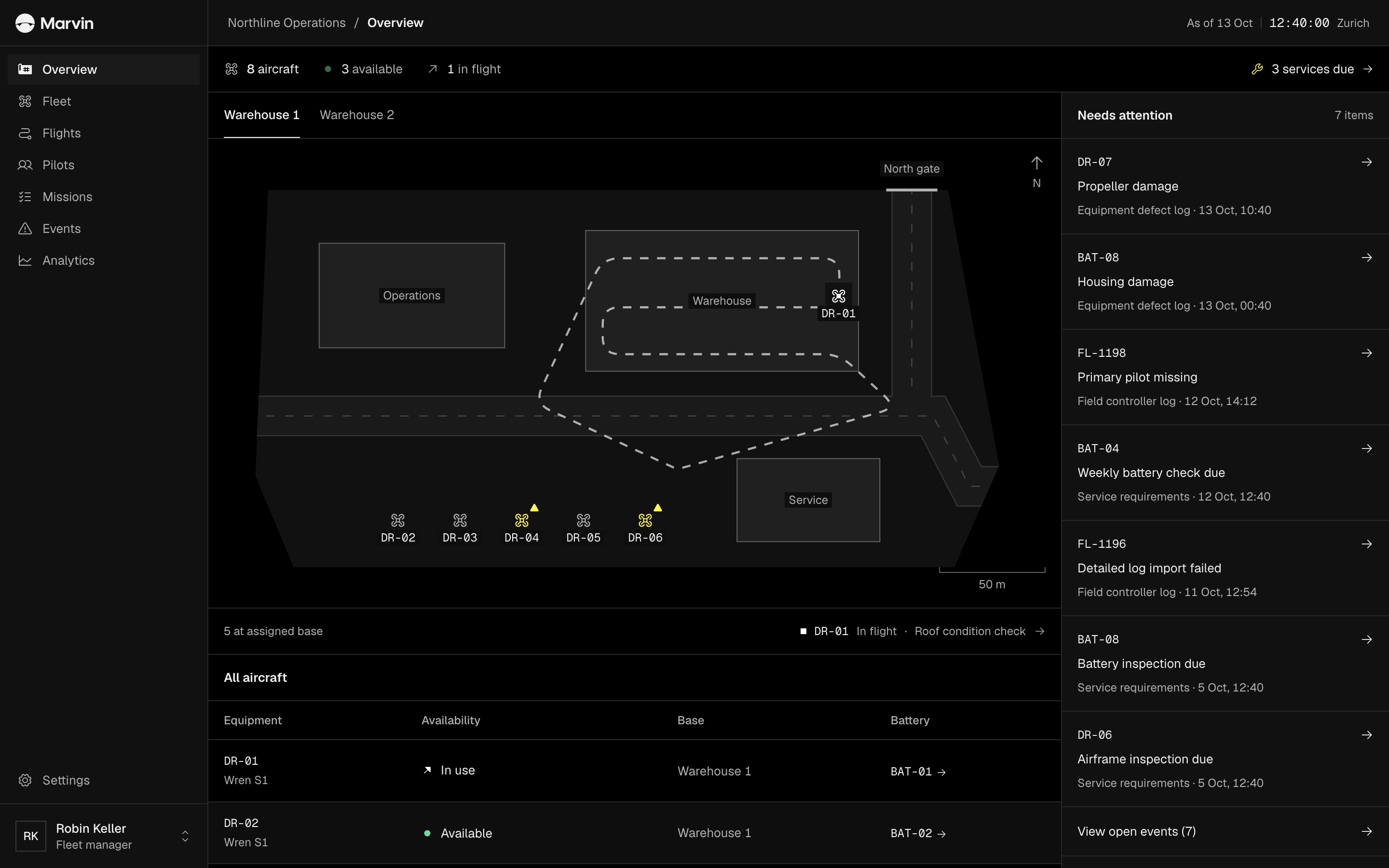 Marvin's fleet overview: a plan of a warehouse with aircraft markers, two with yellow service triangles, one in flight, and a list of what needs attention